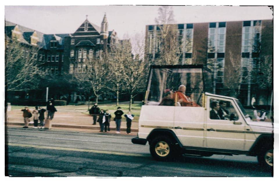 The Pope is driven down Lindell Avenue in the Popemobile